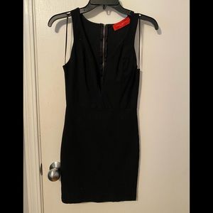 Low plunge black akira dress!